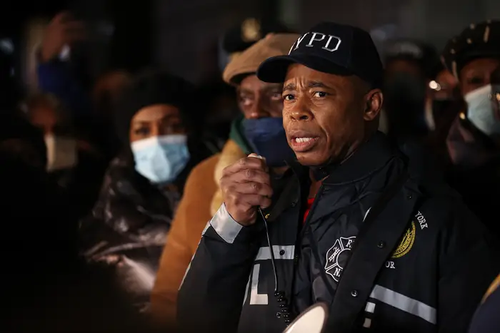 Mayor Eric Adams speaks as hundreds of police officers and FDNY officers are gathered at 32nd Precinct for vigil over two officers shot in Harlem on January 22.
